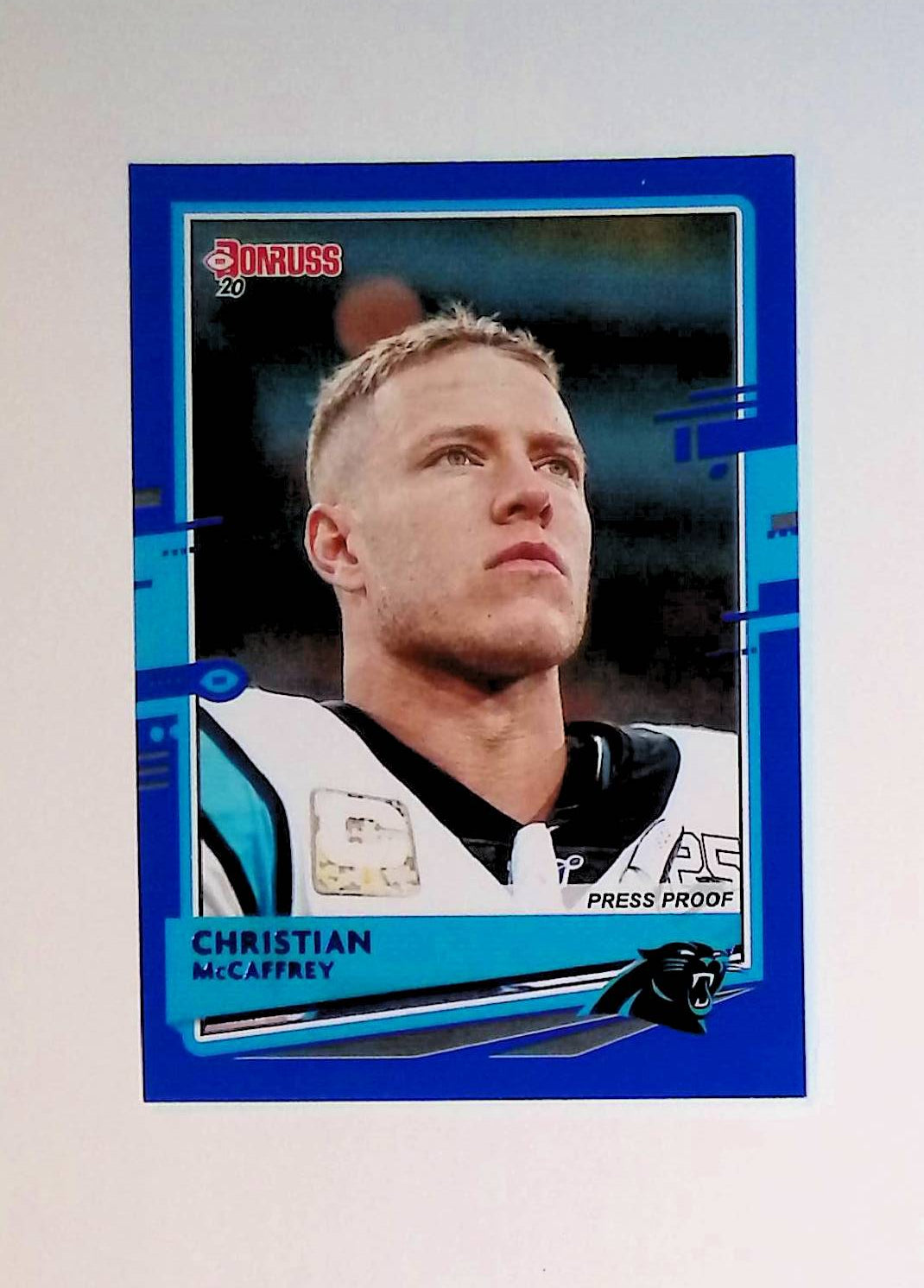 Christian McCaffrey 2020 Donruss Press Proof Blue #48 (Photo Variation SP) - LoCo Collectables